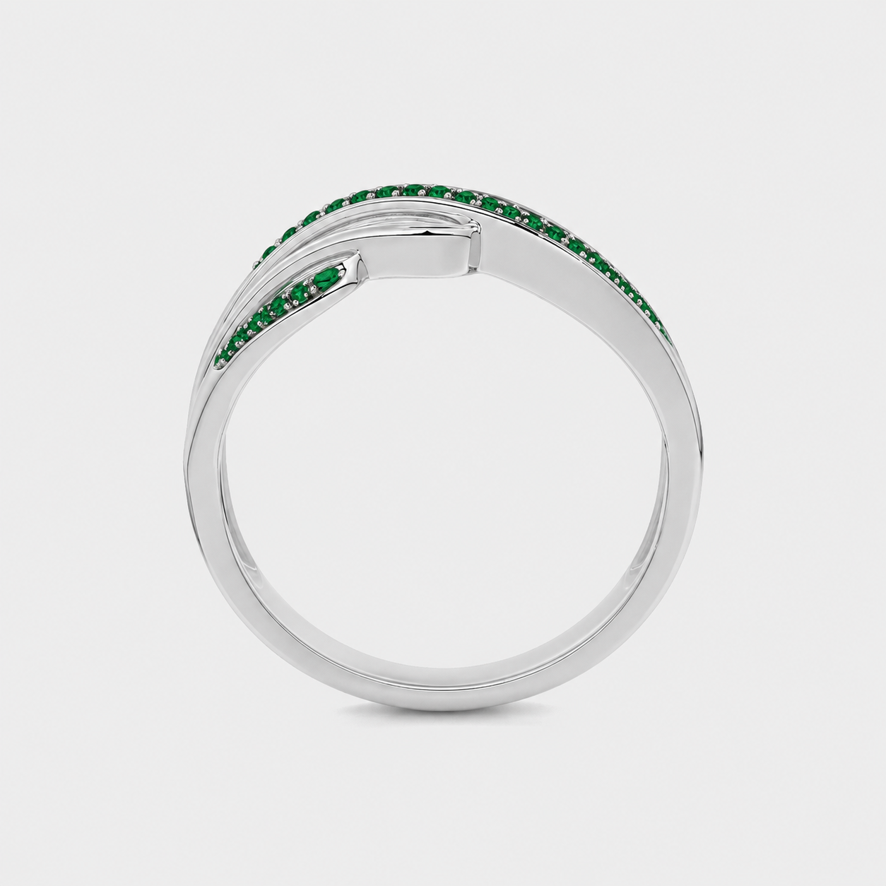 Side profile of silver-tone leaf vine statement ring with polished finish and botanical-inspired design