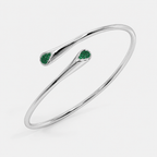 Silver-tone open cuff bracelet with emerald green pavé cubic zirconia accents 