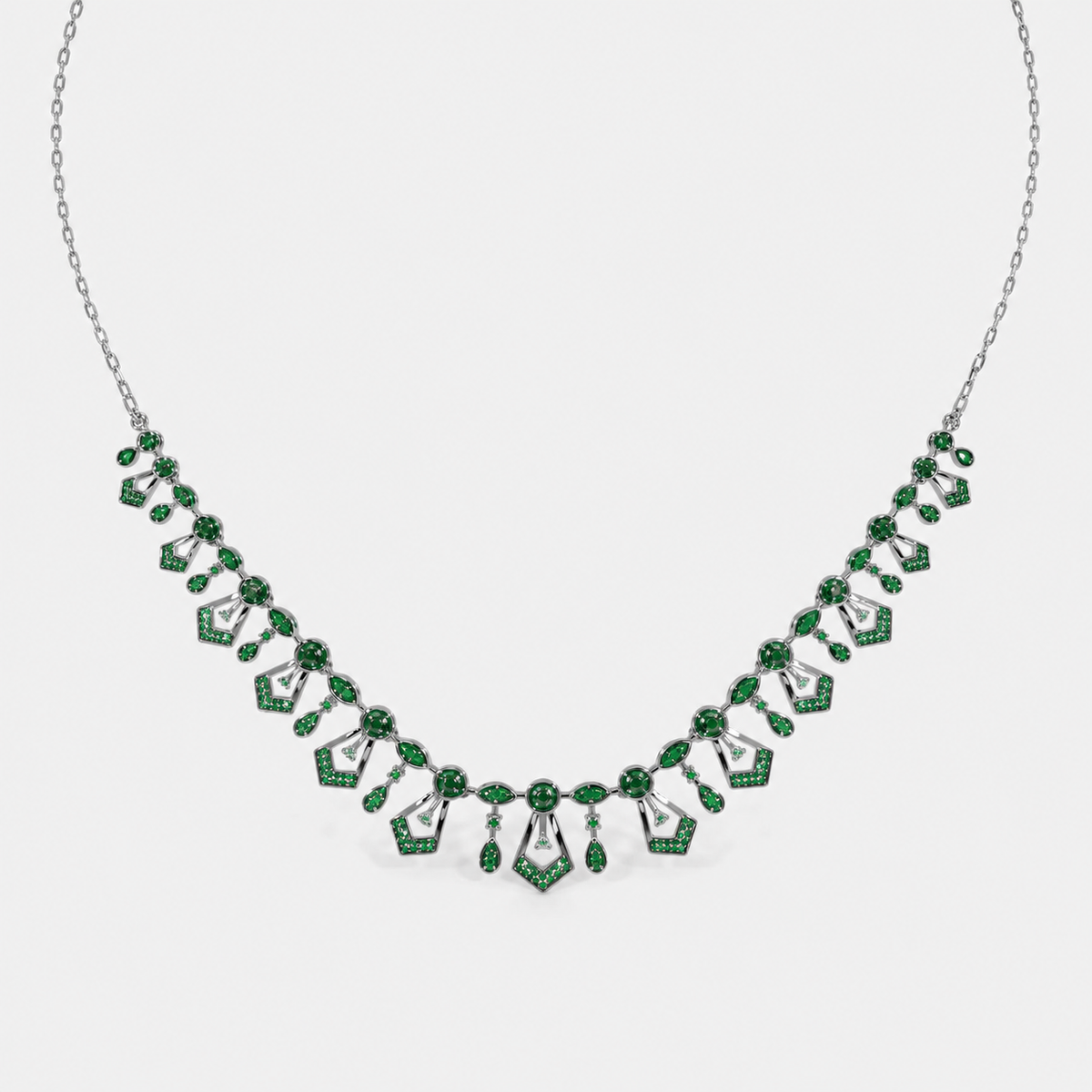 Elegant silver-tone statement necklace showcasing emerald green gemstone-inspired accents and adjustable chain
