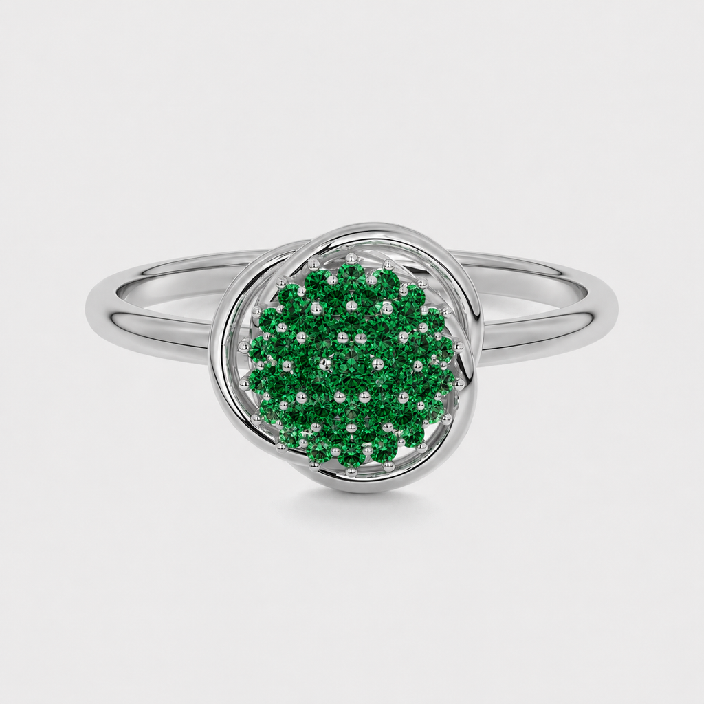 Front view of silver-tone halo ring with emerald green cubic zirconia cluster centerpiece