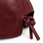 Back view with knotted leather strap