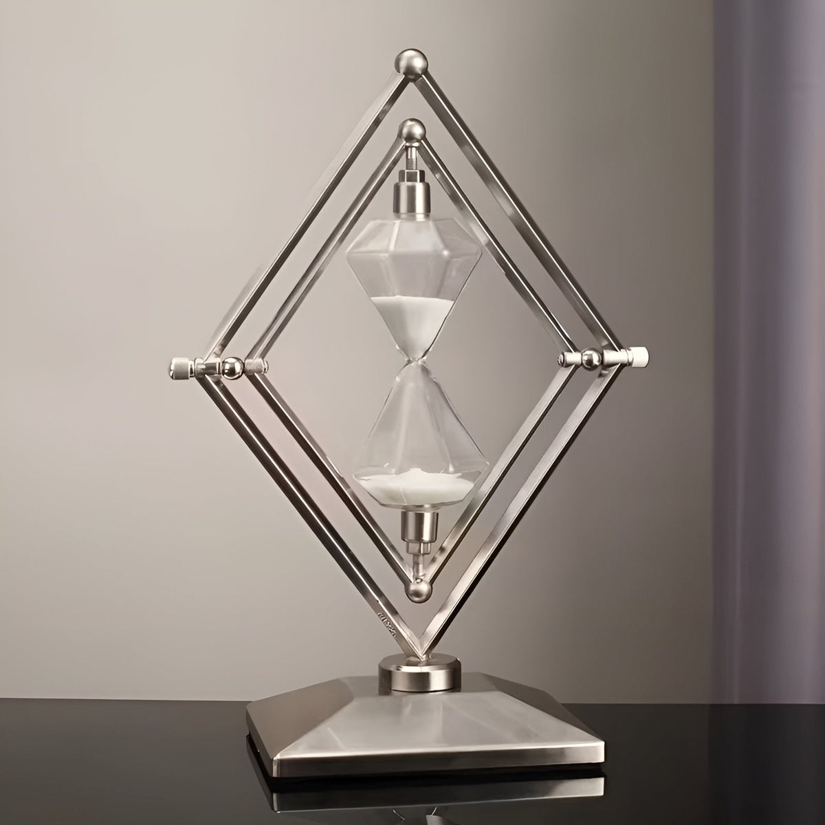 Hourglass with geometric metal frame – Meditation timer with white sand