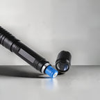 Durable tactical laser torch for camping, hiking, and outdoor survival; includes fire starter.