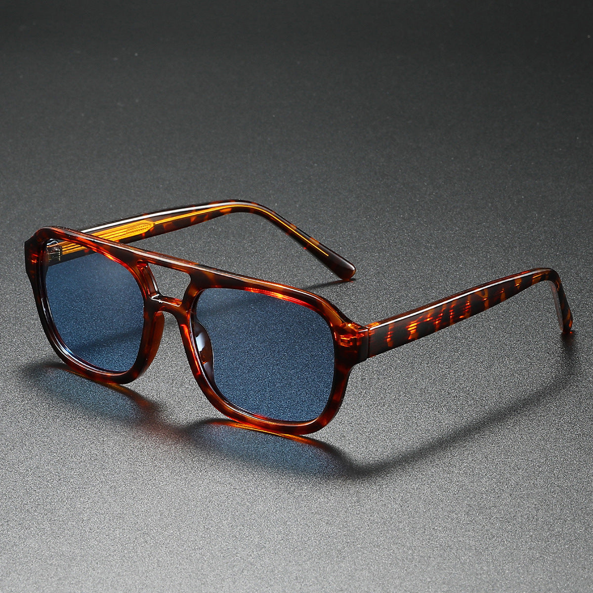 Women's fashionable sunglasses in elegant, angular design